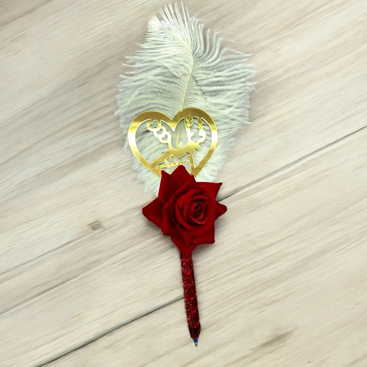 Nikhayi Pen with velvet wrap, red rose, and white feather for Nikah ceremony